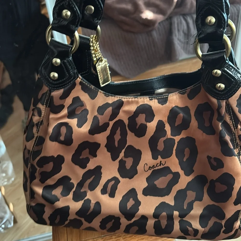Coach Shoulder Bag.   There are a few spots on the inside from make up. As is - Picture 4 of 5